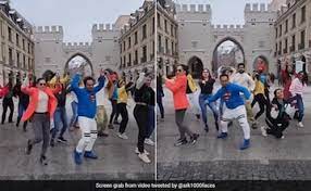 In the freezing weather of Germany, fans dance to Jhoome Jo Pathaan, and SRK responds